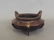 A Chinese twin handled lobed bronze censer with gilt