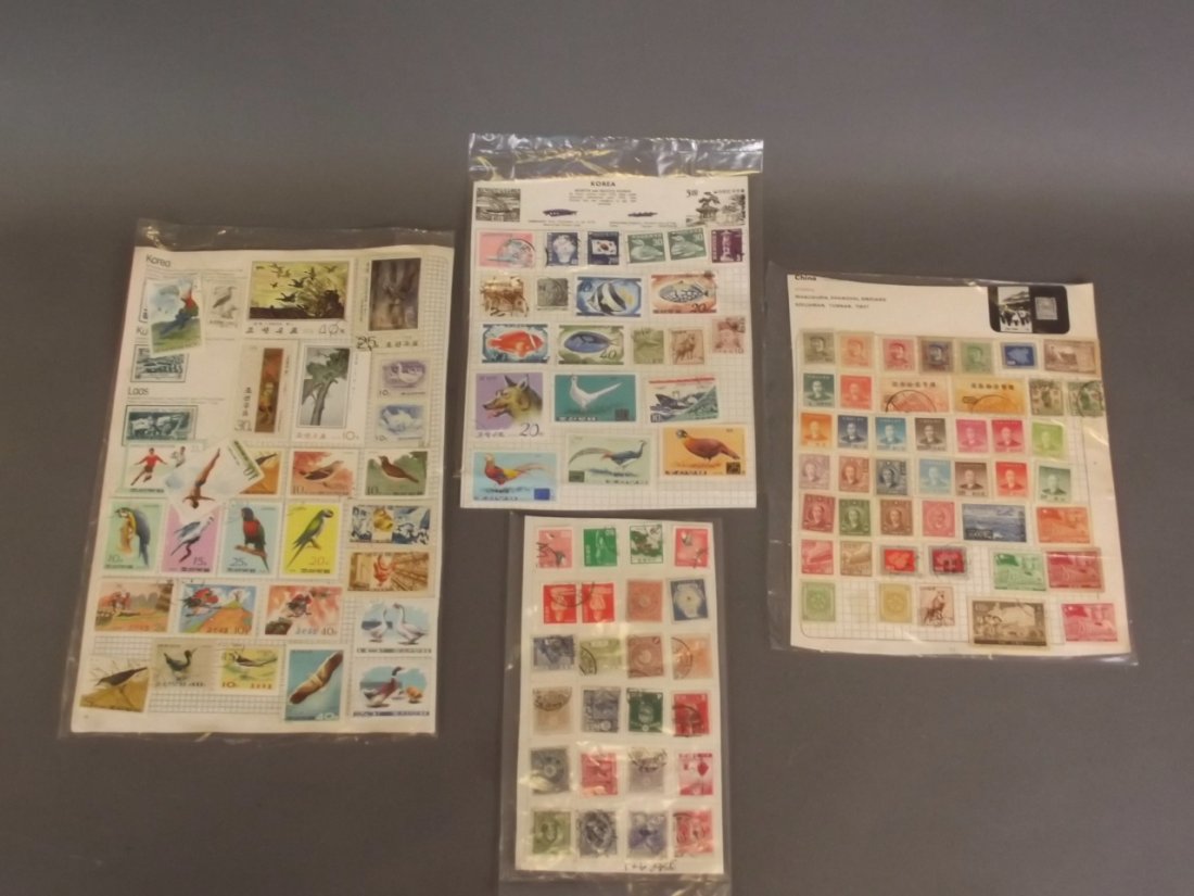 Four sheets of Oriental stamps, Japan, China, Korea (1 of 5)