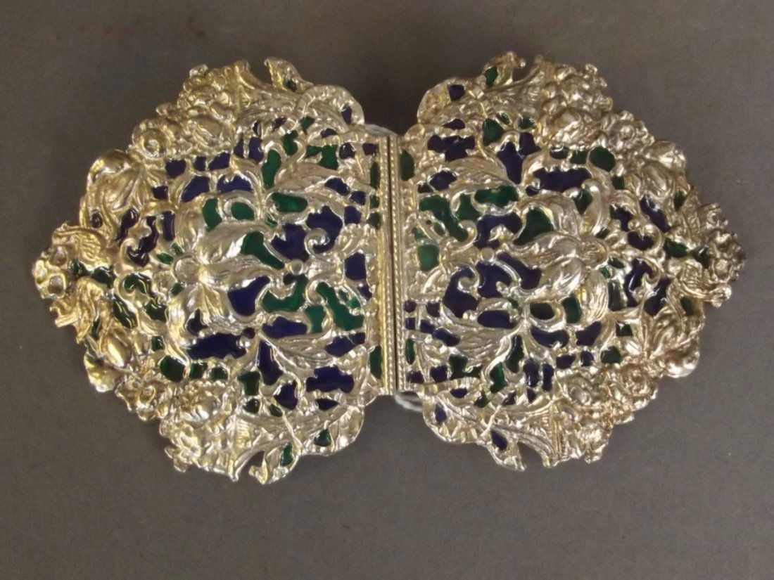An ornate silver plate and plique-à-jour nurse's (1 of 2)