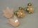 A pair of brass wall lights with frilled glass shades,