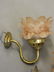 A pair of brass wall lights with frilled glass shades, - 2