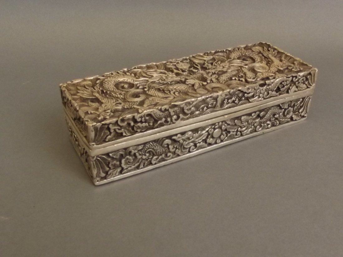 A Chinese white metal scribe's box with incised twin (1 of 4)