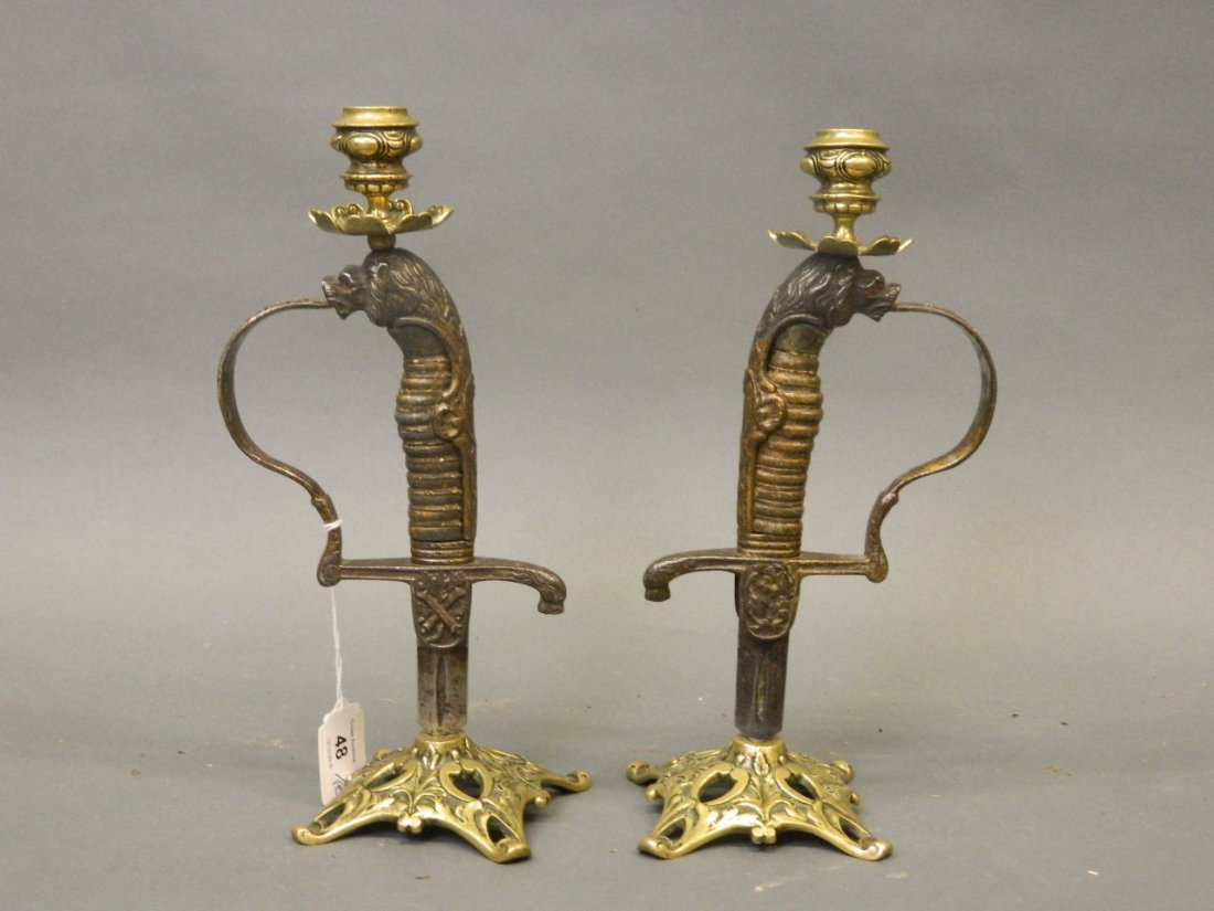 A pair of antique sword hilts with shagreen grips, (1 of 4)