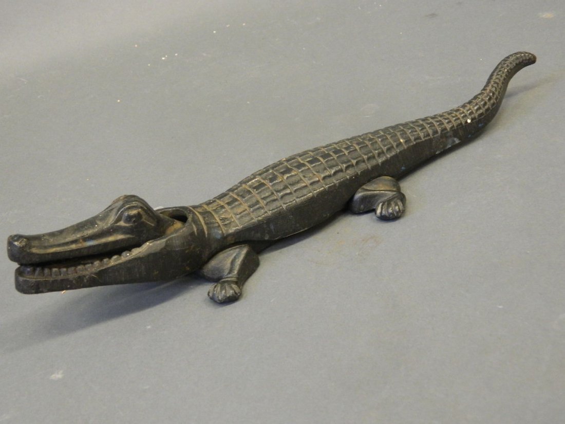 A large pair of cast iron nutcrackers in the form of a (1 of 1)