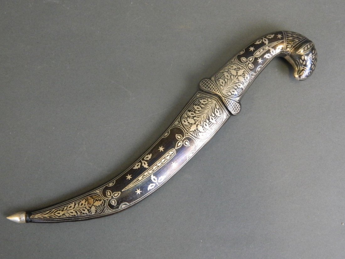 A Bidri style dagger with white metal sheath, the hilt (1 of 2)