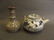 A Chinese stoneware teapot with blue and white floral