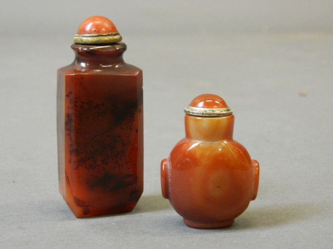 A Chinese carved agate snuff bottle, and another: A Chinese carved agate snuff bottle, and another smaller, 3" high