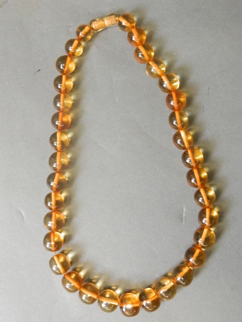 A Baltic honey amber graduated bead necklace, 83g, 22" (1 of 2)