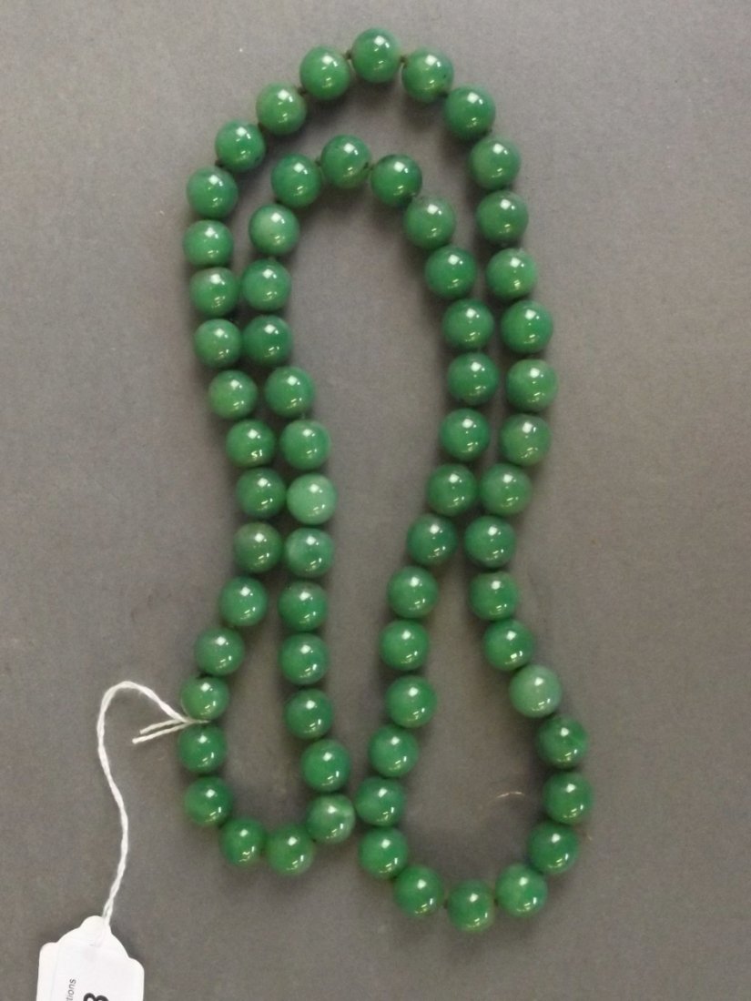 A string of jade beads, 32" long (1 of 1)