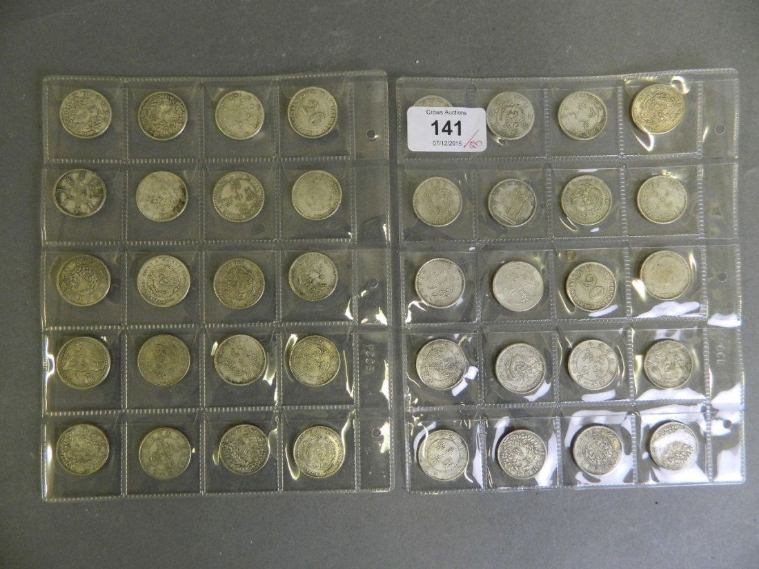 A collection of facsimile Chinese coins from (1 of 2)