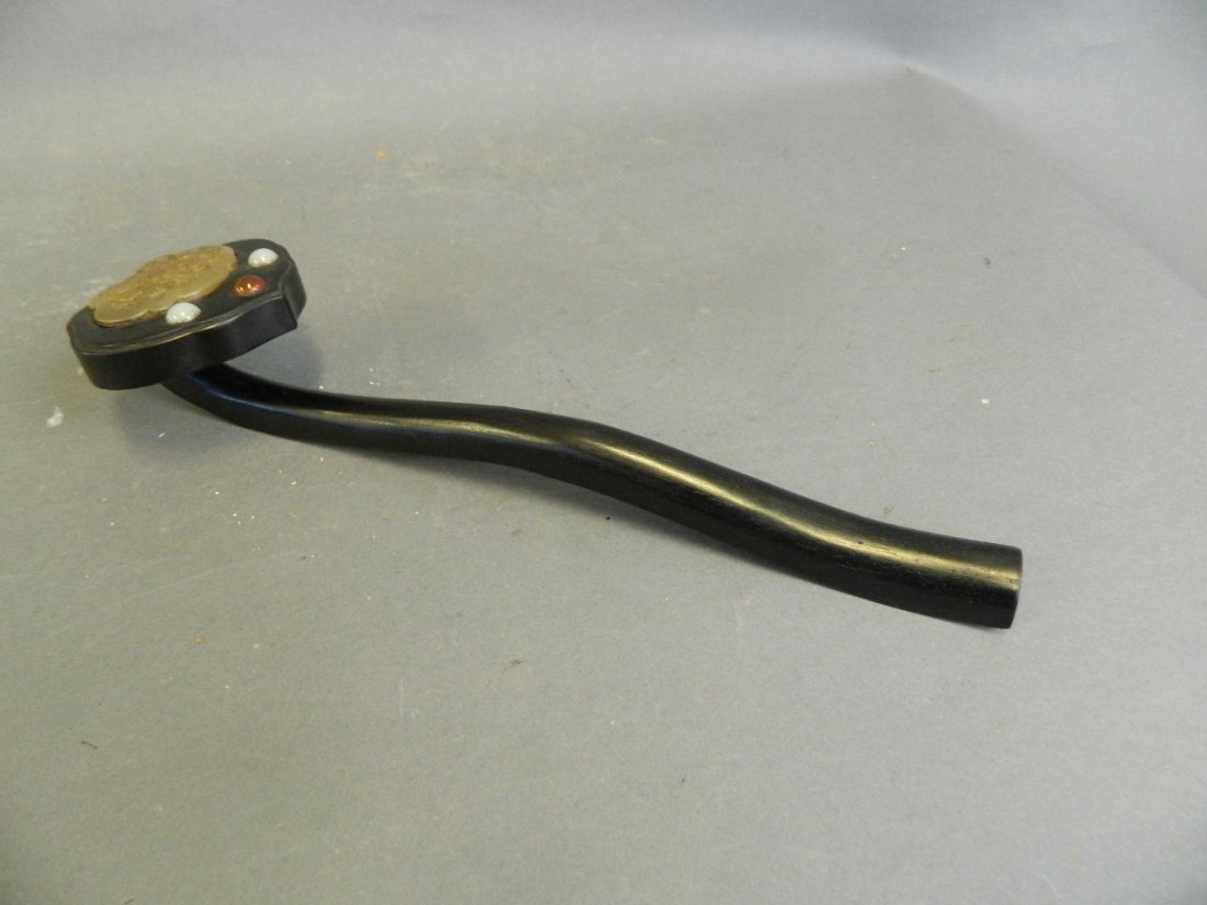 A Chinese ebonised wood ruyi with inlaid hardstone (1 of 2)