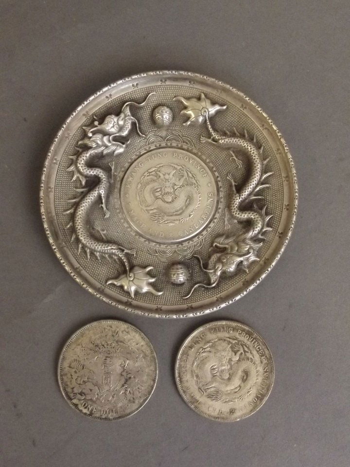 A Chinese white metal coin dish with repoussŽ dragon (1 of 1)