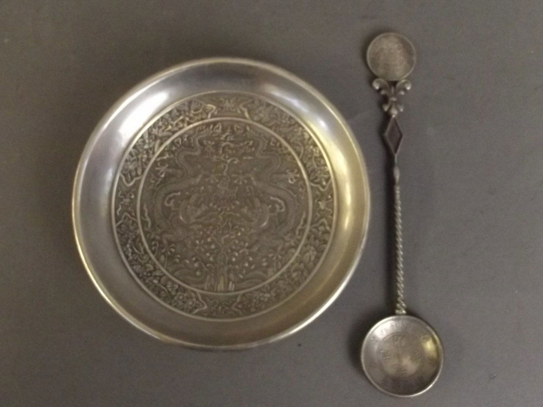 A Chinese silvered metal trinket dish with twin dragon (1 of 3)