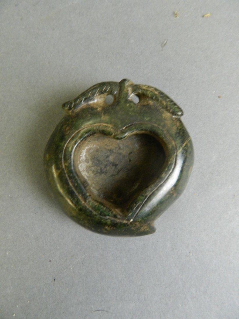 A Chinese carved green hardstone ink pot in the form of (1 of 2)