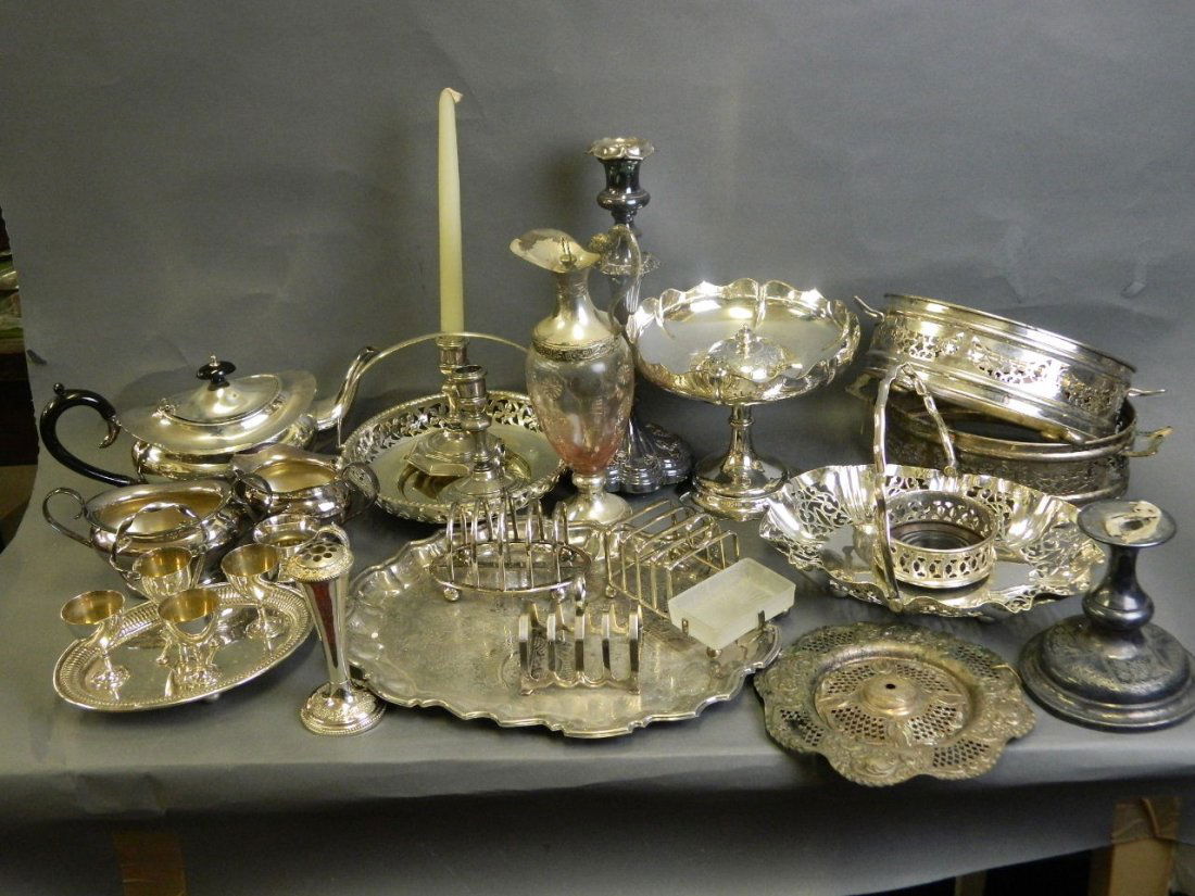 A quantity of silver plate to include two sing handled (1 of 4)