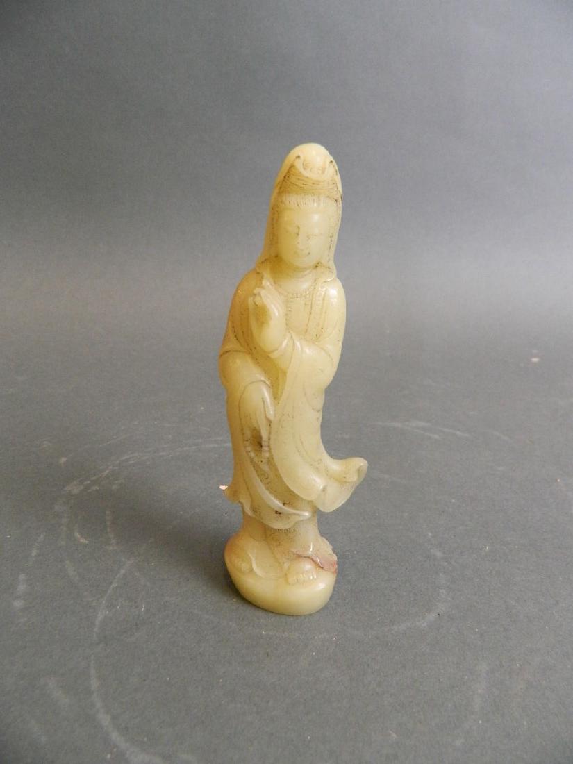 A small Chinese carved soapstone figure of Quan Yin, (1 of 3)