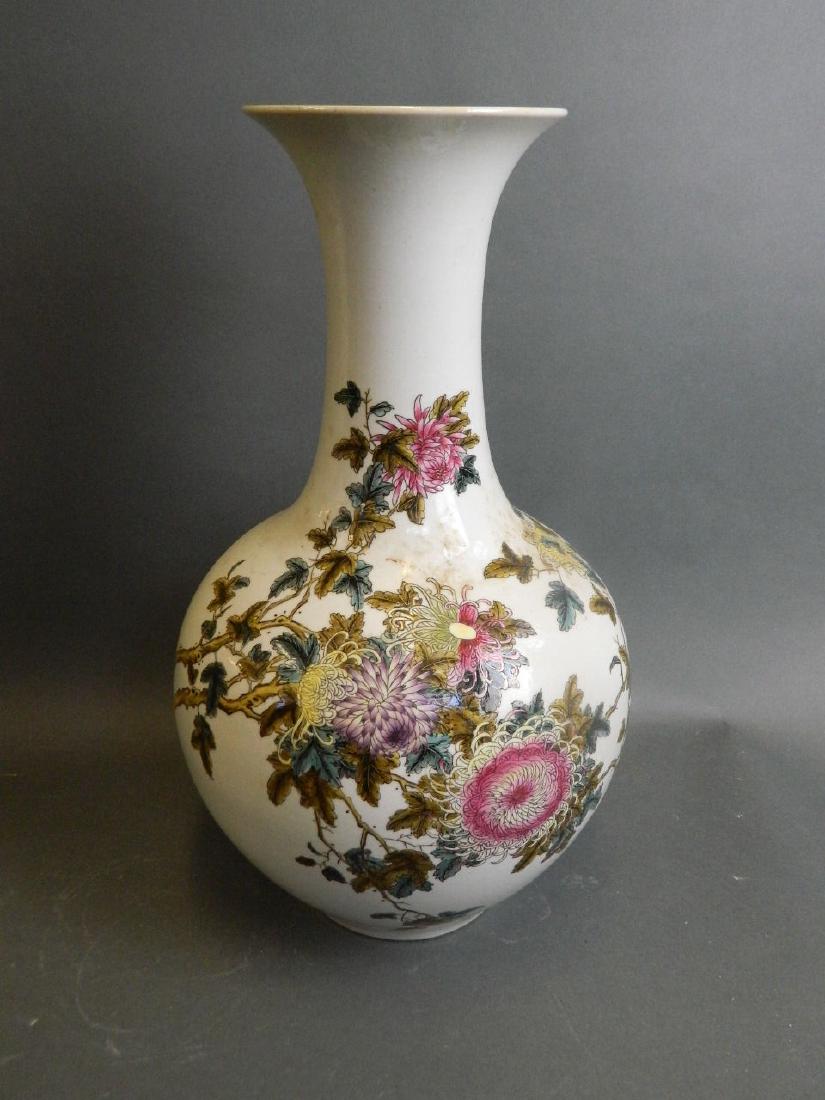 A Chinese porcelain vase with chrysanthemum decoration: A Chinese porcelain vase with chrysanthemum decoration and poem verso, signed to base, 17" high