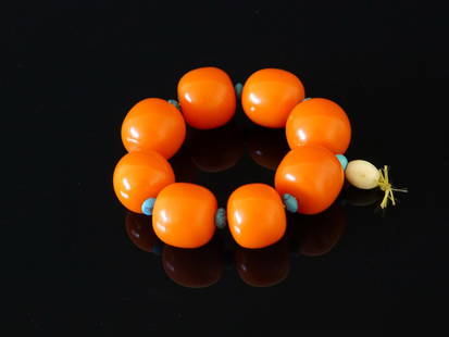 CHINESE AMBER BRACELET: Chinese Amber Bracelet. Diameter 2.3" (5 cm) and adjustable, 8 pcs of beads, size from 25.5 to 27.5 mm.