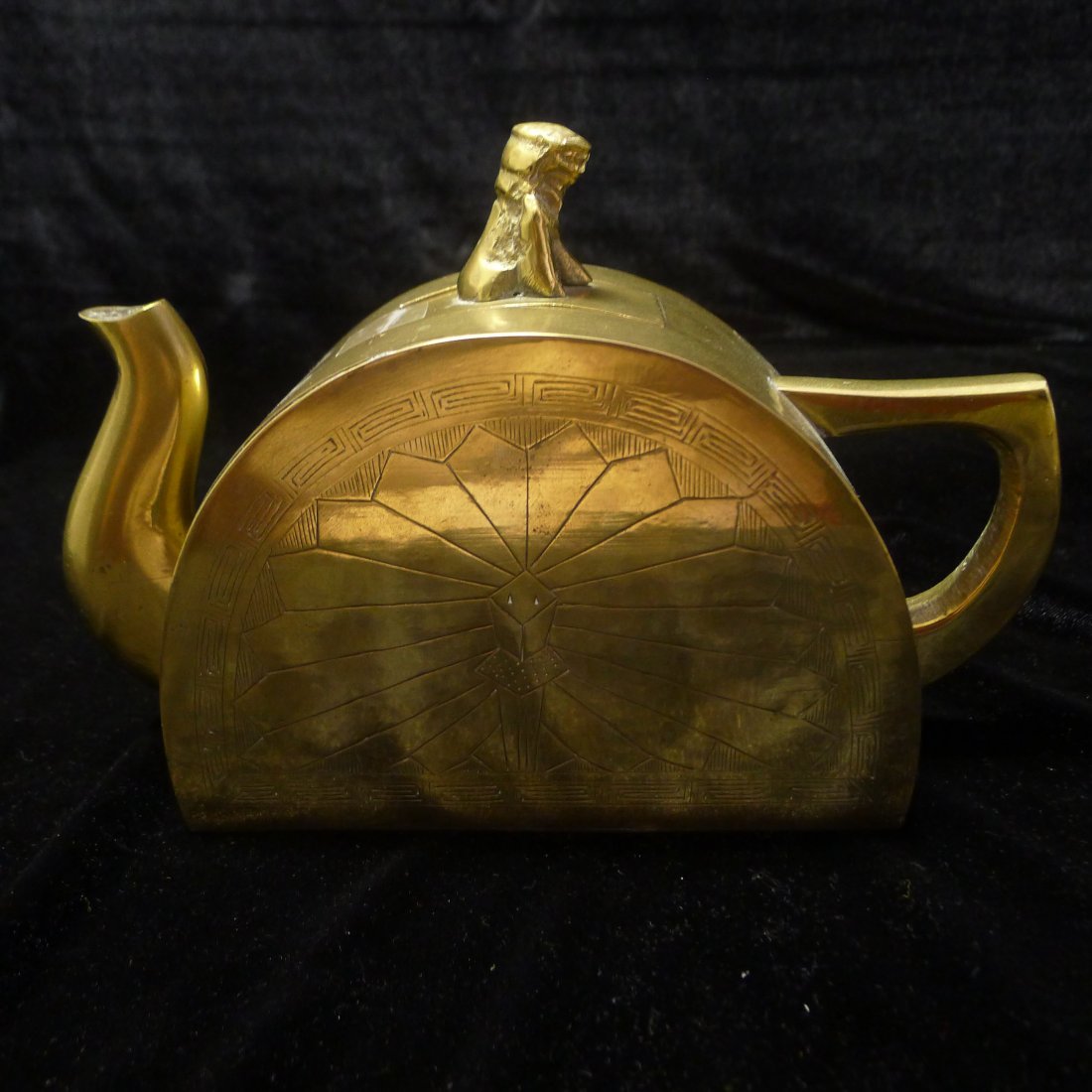 THE BRONZE TEAPOT: The bronze teapot, carving design with small monster on the cover for the handle, size: 5.2" (13 cm) height x 5.8" x 2.5"