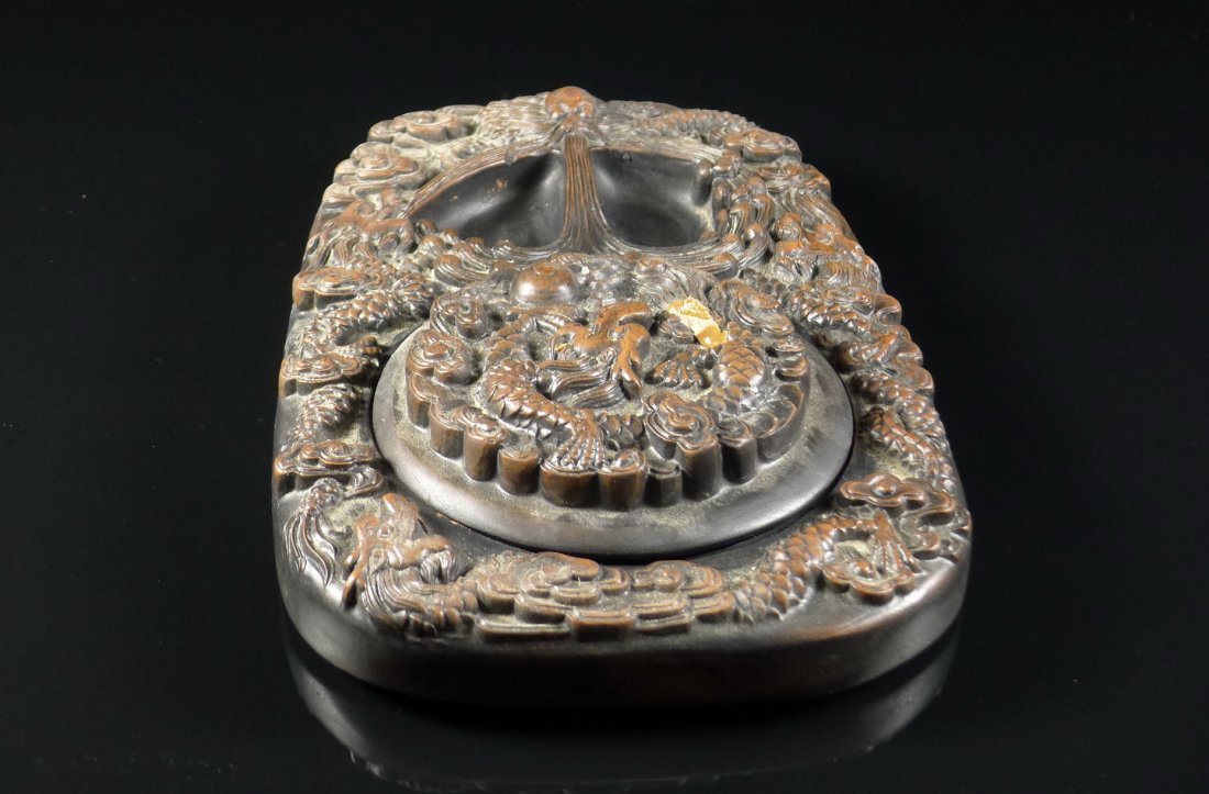 CHINESE CARVING INK STONE: Chinese carving inkstone, design with dragon, swan, cloud etc. mascot, size: 24 x 16 x 4 cm.