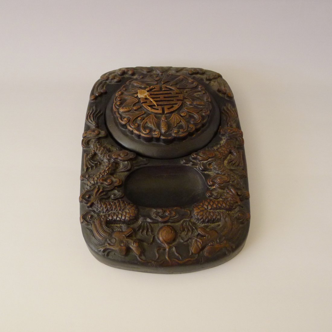 CHINESE CARVING INKSTONE: 雕刻硯台 Chinese carving inkstone, design with double dragons play with ball with cloud etc., the cover is designed with five bats with the happiness Chinese character in the m