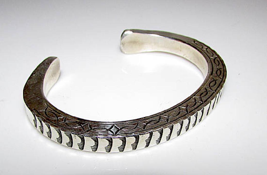 Navajo Sterling Silver Cuff Bracelet with Heavy Hand (1 of 2)