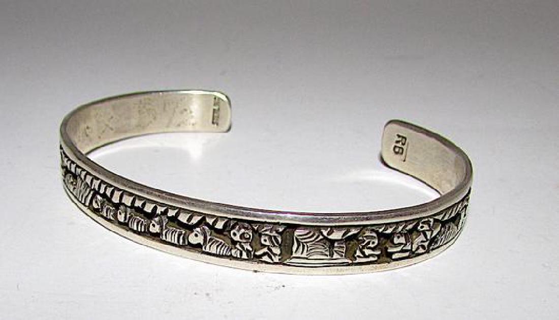 Native American Navajo Sterling Silver Storyteller Cuff: For your consideration is this wonderful Navajo sterling silver bracelet by the highly collectible artist Randy Billy. The bracelet features a detailed, hand etched storyteller design in sterling silv