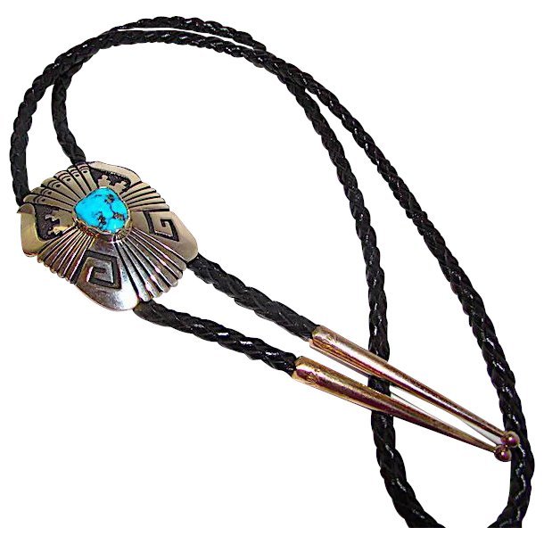 Navajo TOMMY SINGER Sterling Turquoise BOLO Tie: Stunning bolo by the highly collectible, regarded and award winning artist Tommy Singer. Classic example of Tommy's work with hand etched tribal Navajo design, accented with a stunning, nice size King
