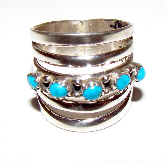 Navajo Serling Turquoise Ring: Navajo Serling Turquoise Ring. Signed. Size 9, 1" wide. Signed "WB", marked sterling