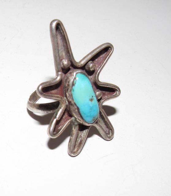 Vintage Navajo Statement Ring Sz.7: Vintage Navajo Statement Ring Sz.7 Contemporary Design. Measure 1 3/4". Unmarked as most vintage Native pieces and has been tested for silver content.