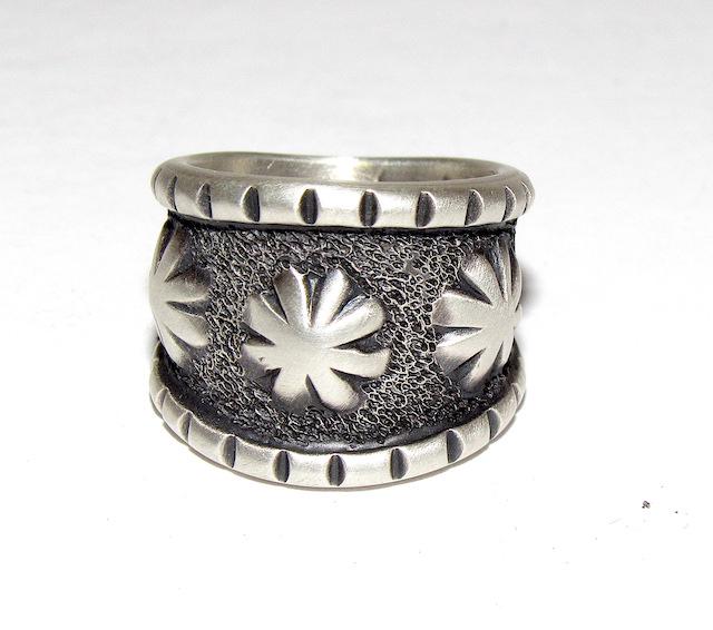 Navajo Monty Claw Starburst Ring Sz. 6.5: Navajo Monty Claw Starburst Band Ring Sz. 6.5. Tufa cast, weighs about 15 gr. Singed, marked, tested. Exceptional craftsmanship and attention to detail. Award winning, highly collectible and th]]sough