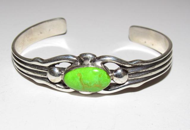Navajo Sterling Gaspeite Bracelet: Navajo Sterling Gaspeite Bracelet. Vernon Clarissa Hale. 25 Gr. Sand cast. 6.5 inside circumference. Singed, stamped sterling.