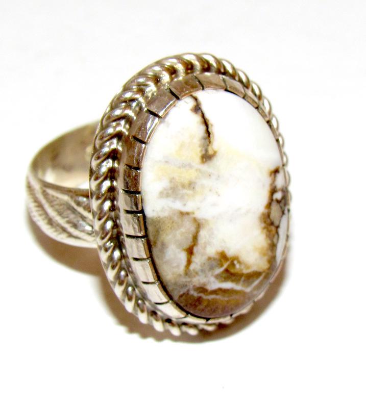 Navajo Chris Etsitty White Buffalo Ring Sz.7: Navajo Chris Etsitty White Buffalo Ring Sz.7. Singed, marked, tested. 1" on the front.