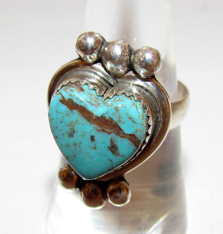 Navajo Sterling Turquoise Heart Ring Sz. 7: Navajo Sterling Turquoise Heart Ring Sz. 7. 1 1/4" on the front. Singed, marked, tested.