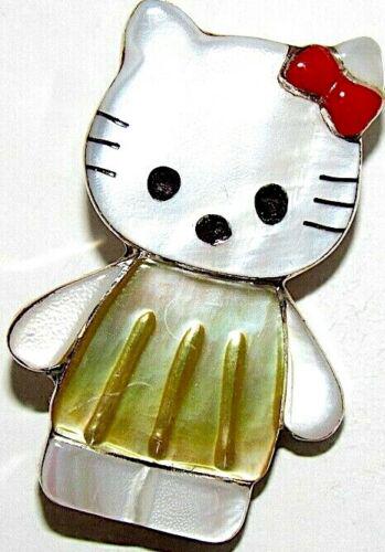 Rare Zuni HELLO KITTY Sterling Inlaid Stone Pin Pendant: Stunning rare ZUNI Hello Kitty pin pendant by P. Leekity. The pin features an intricately hand etched one of the most popular, adorable Hello Kitty character design in sterling silver, accented with i