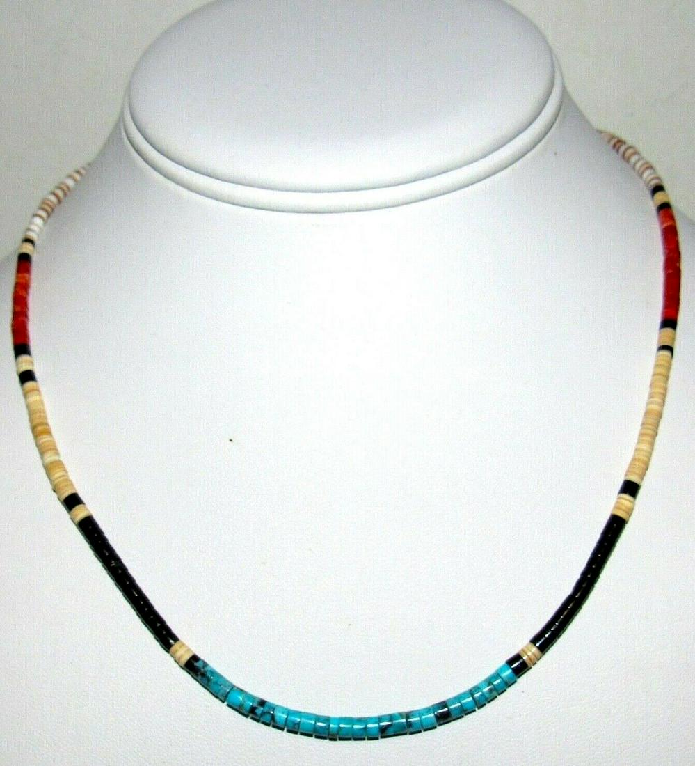 Santo Domingo Heishi Necklace Turquoise Coral Jet: Wonderful, dainty and elegant Santo Domingo choker necklace with turquoise, coral, jet , and rolled shell beads with sterling silver clasp by a Santo Domingo artist J. Calabaza. The necklace is a chok