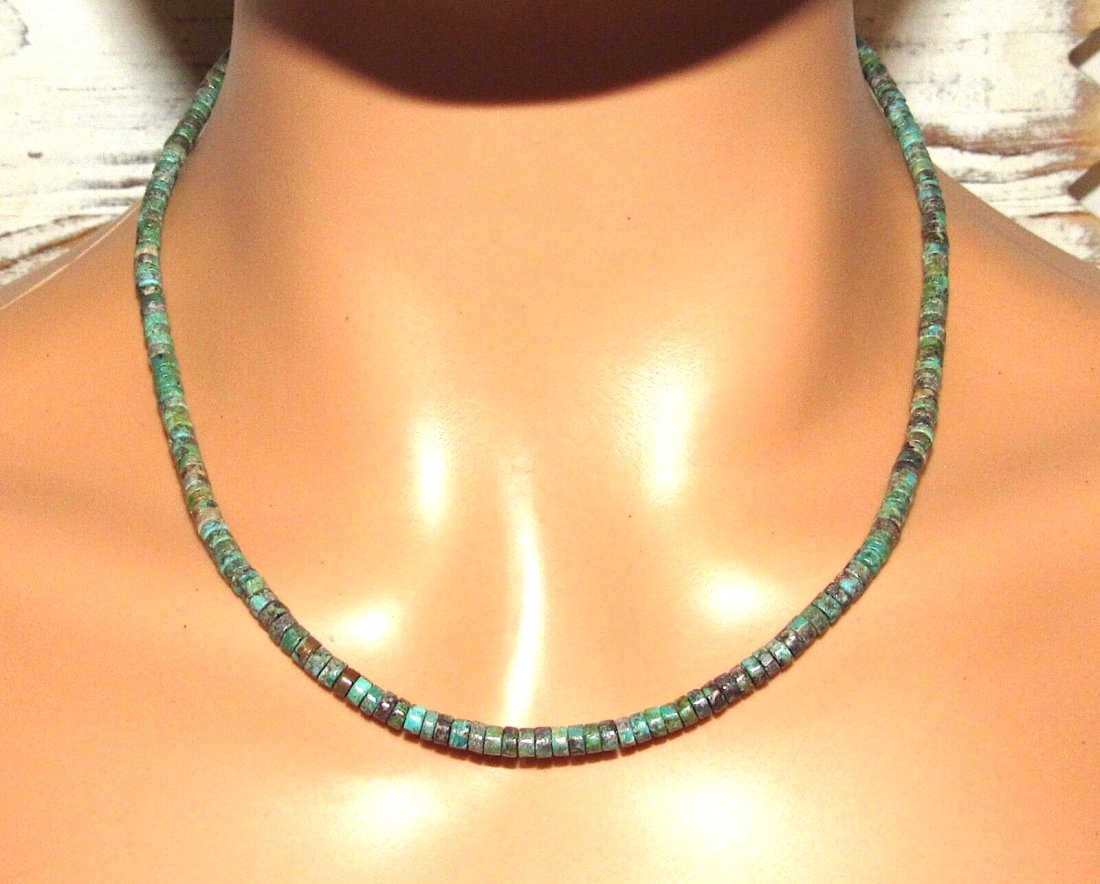 Navajo Rolled Turquoise Heishi Choker Necklace Native American 18L: Stunning Navajo Kingman turquoise small rolled heishi beads choker necklace with sterling silver clasp. Measures about 18" long. Rolled turquoise bead color and matrix vary slightly. Gorgeous, elegant