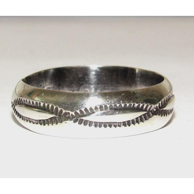 Navajo Band Ring Size 10 Sterling Silver Ingot Band Rob Cadman: Native American Navajo sterling silver ingot hand etched and stamped tribal design band ring by the Navajo artist Rob Cadman. The ring is size 10. Measures about 1/4" wide at the widest point. Stamped