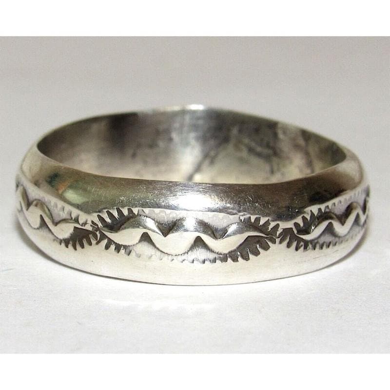 Navajo Band Ring Size 9 Sterling Silver Ingot Band Rob Cadman: Native American Navajo sterling silver ingot hand etched and stamped tribal design band ring by the Navajo artist Rob Cadman. The ring is size 9. Measures about 1/4" wide at the widest point. Stamped 