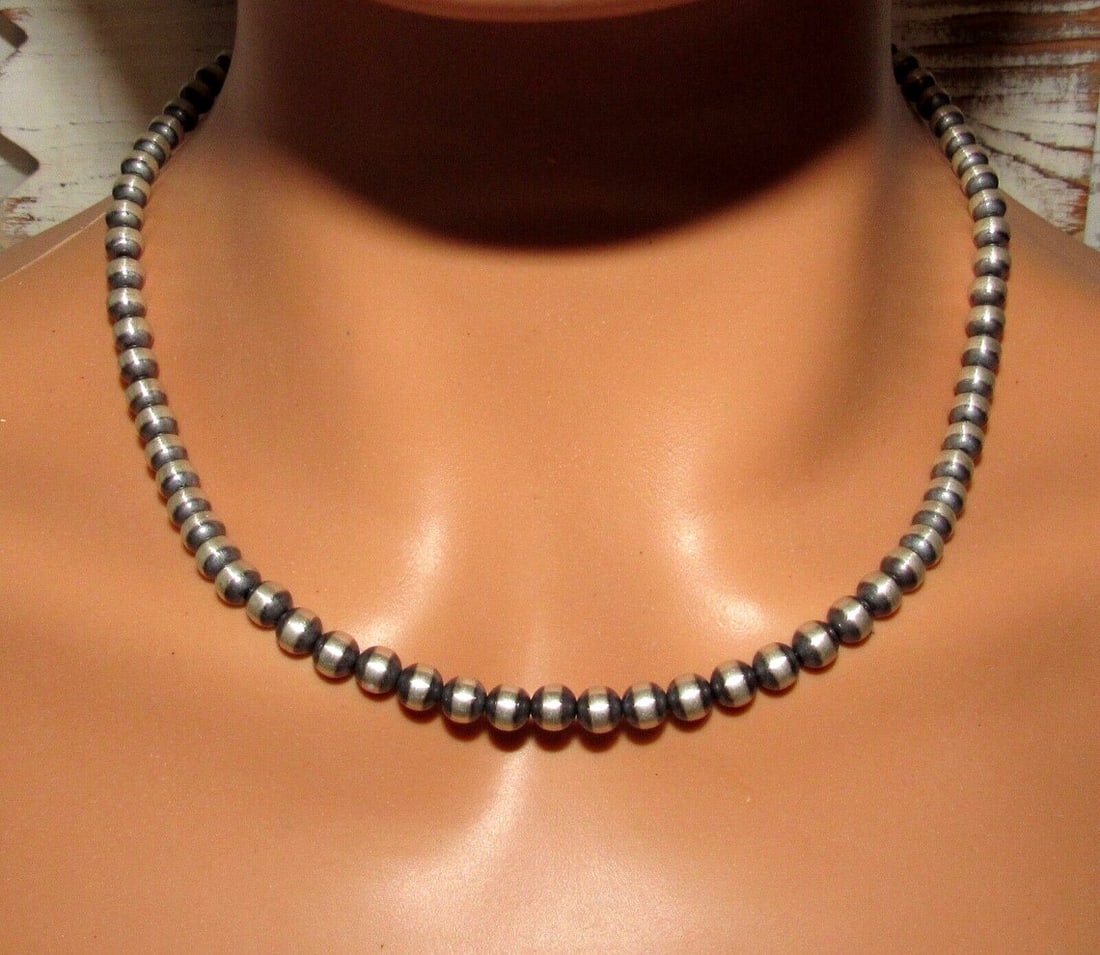 Navajo Pearls Necklace Sterling Silver 6mm Beads Necklace 18"L Choker: Classic Navajo pearls necklace with 6mm sterling silver beads design by the Navajo artist M Lee. Hook & eye closure. Measures 18" long. Gorgeous, elegant & timeless necklace that is sure to complement