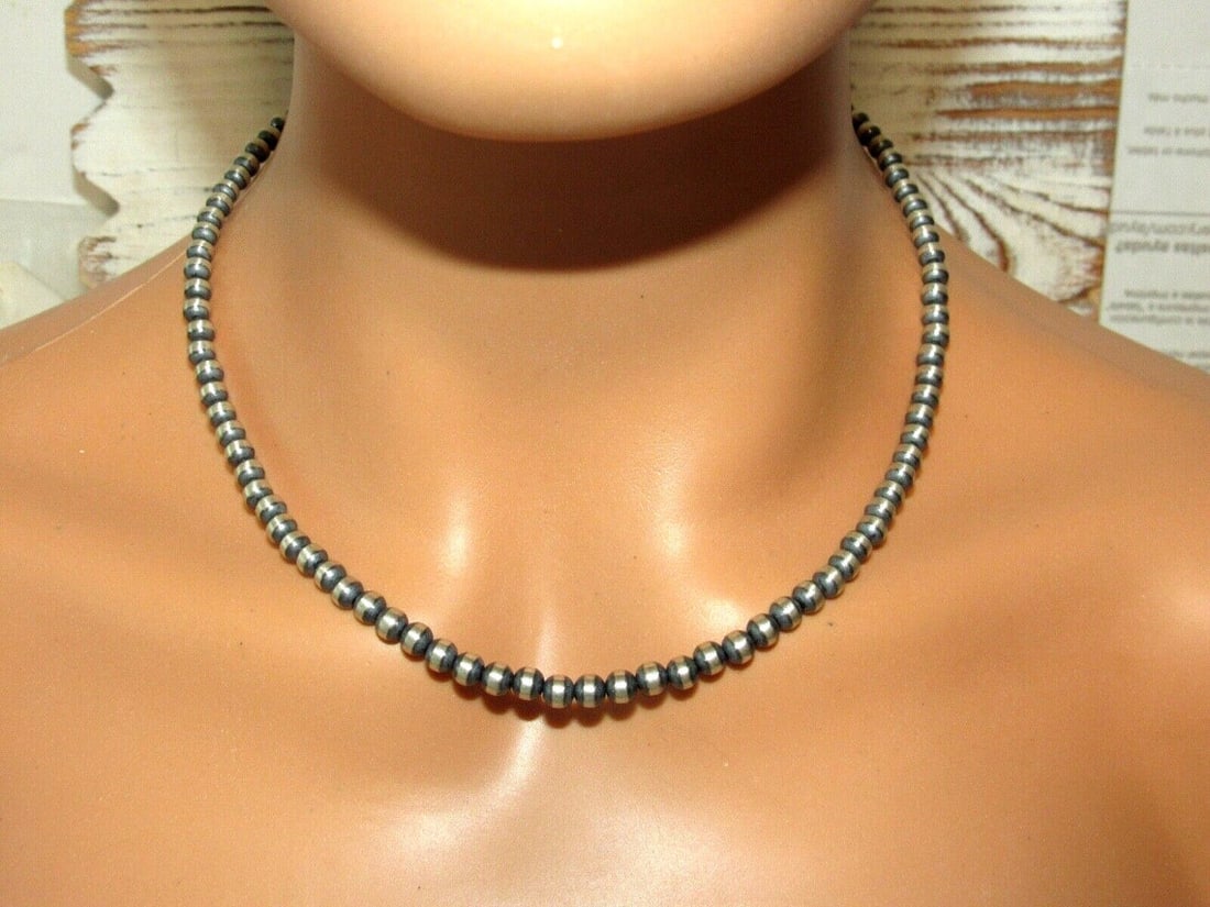 Navajo Pearls Necklace Sterling Silver 5mm Beads Necklace 18"L Choker: Classic Navajo pearls necklace with 5mm sterling silver beads design. Hook & eye closure. Measures 18" long. Gorgeous, elegant & timeless necklace that is sure to complement any outfit. Wonderful gift