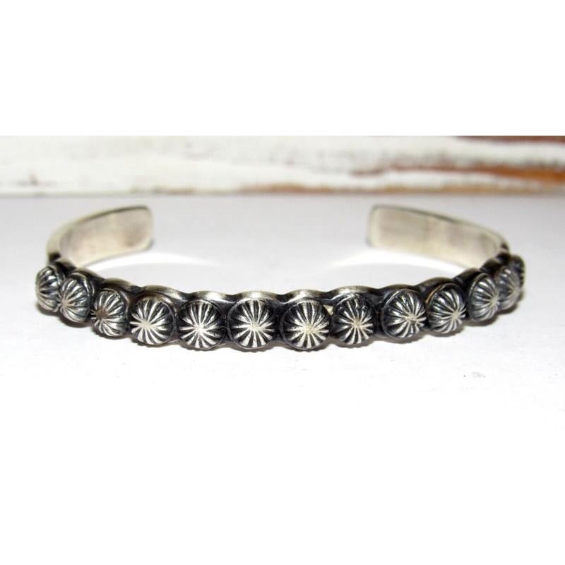 Navajo Stacker Cuff Bracelet Sterling Silver Martha Cayatineto: Fab sterling silver Native American Navajo stacker cuff bracelet by the collectible Navajo artist M. Cayatineto. Traditional repousse design on the front set in substantial sterling silver setting. Th