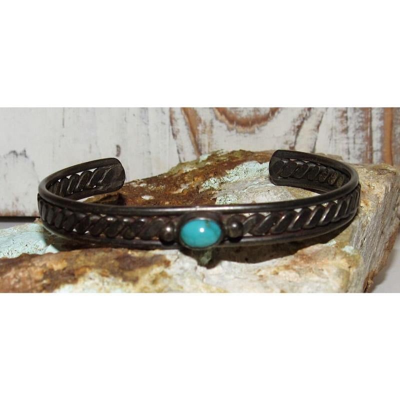 Old Pawn Navajo Turquoise Stacker Cuff Bracelet Sterling Silver: For your consideration is this classic example of vintage Navajo jewelry. The bracelet features a traditional cuff design in sterling silver accented with a turquoise cabochon on the front. Age approp