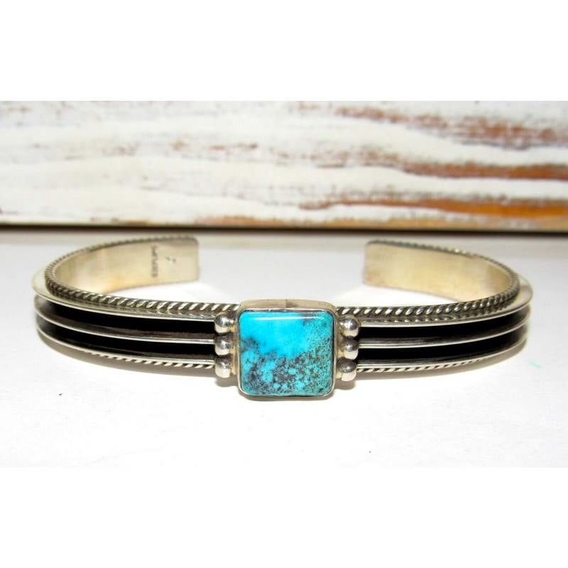 Navajo Kingman Turquoise Sterling Silver Stacker Bracelet D. Yazzie: Stunning Native American Navajo sterling silver and Kingman mine turquoise cuff bracelet by the Navajo artist D. Yazzie.The inside circumference is about 7" including the gap. The gap is about 1", the
