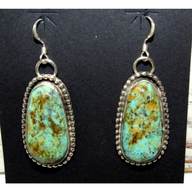 Navajo Turquoise Dangle Earrings Sterling L Hurley: Exceptional Navajo sterling silver and Hachita mine turquoise statement dangle earrings with a French hook by the Navajo artist Leon Hurley. The earrings measure about 1 1/2" long including the hooks.