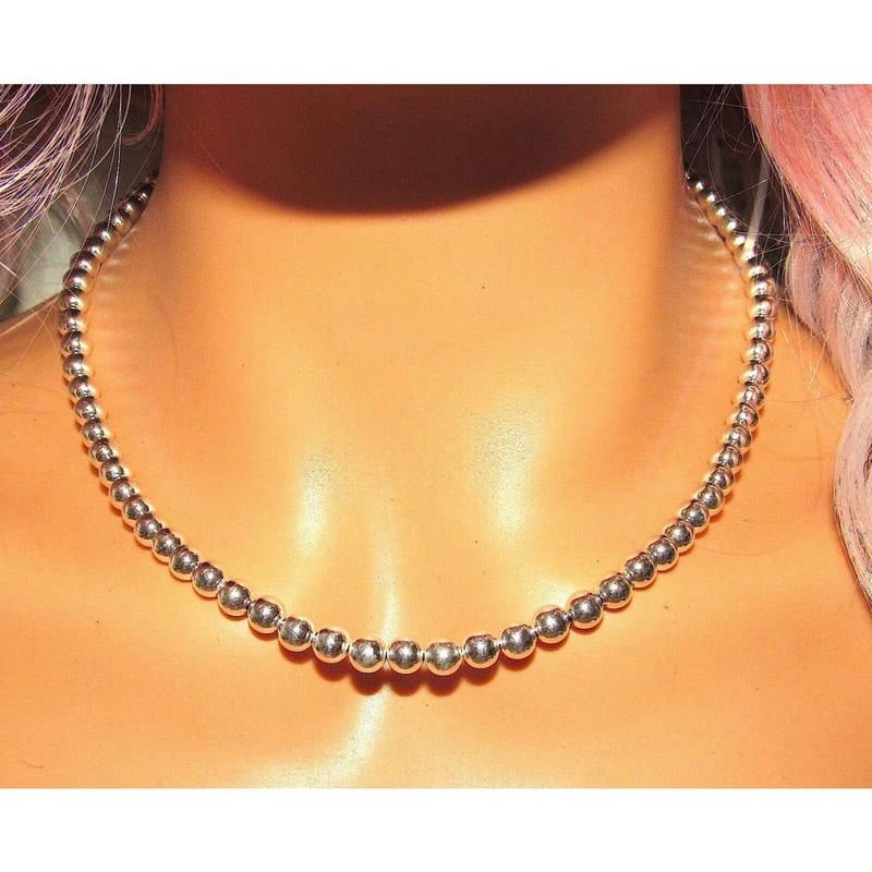 Navajo Pearls Necklace Sterling Silver 6mm Beads Necklace 18"L: Classic Navajo pearls necklace with 6mm sterling silver beads design. High polish finish. Hook & eye closure. Measures 18" long. Gorgeous, elegant & timeless necklace that is sure to complement any ou