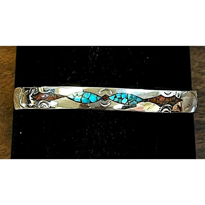 Navajo Turquoise Coral Inlay Stacker Cuff Bracelet Sterling Silver J. Yazzie: Introducing this fab Navajo Sterling Silver Turquoise Coral Inlay Stacker Cuff Bracelet, a captivating creation by the Navajo artist J. Yazzie. Measuring 5/16" in width, this exquisite piece adds vibr