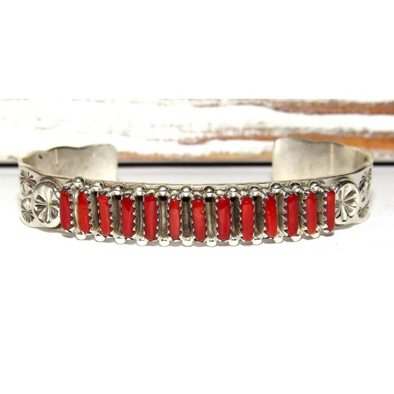 Zuni Mediterranean Coral Cuff Bracelet Sterling Silver Stacker: Traditional vintage Native American Zuni hand etched cuff bracelet with a row of petit point Mediterranean coral cabochons on the front. Wonderful craftsmanship accented with a row of petit point cora