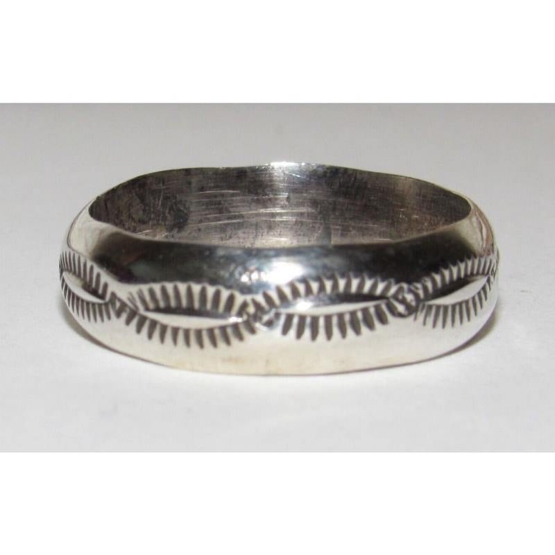 Navajo Band Ring Size 8.5 Sterling Silver Band Rob Cadman: Native American Navajo sterling silver ingot hand etched and stamped tribal design band ring by the Navajo artist Rob Cadman. The ring is size 8.5. Measures about 1/4" wide at the widest point. Stampe