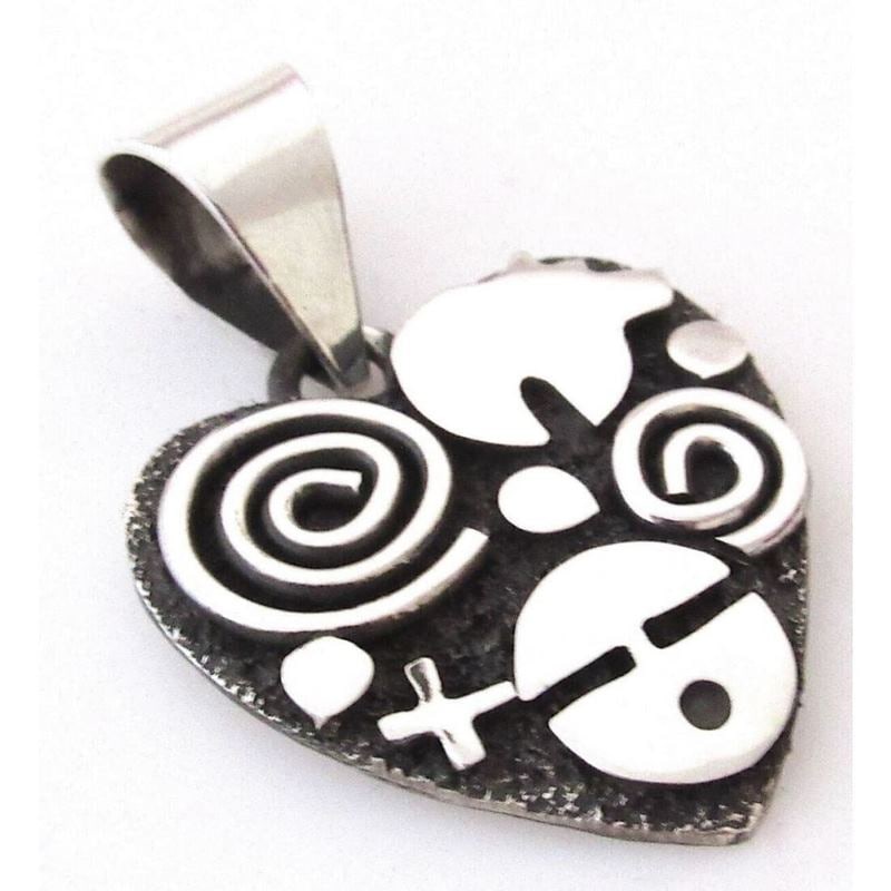 Navajo Alex Sanchez Petroglyph Heart Pendant Sterling Silver: Phenomenal Navajo sterling silver petroglyph design heart pendant by the highly collectible Navajo artist Alex Sanchez.The pendant measure about 1" long.Intricate craftsmanship and attention to detail